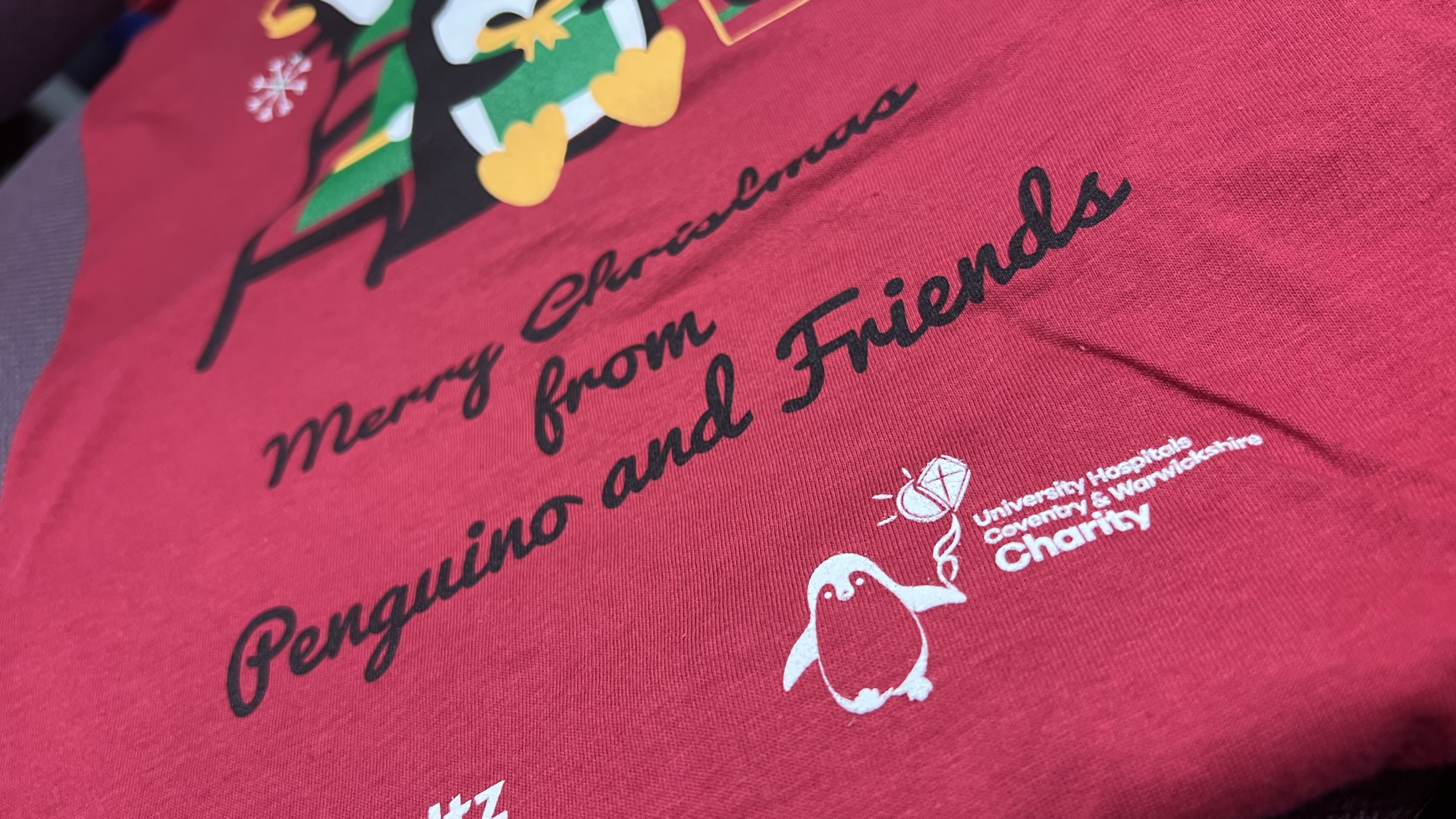 uhcw charity penguin t shirt